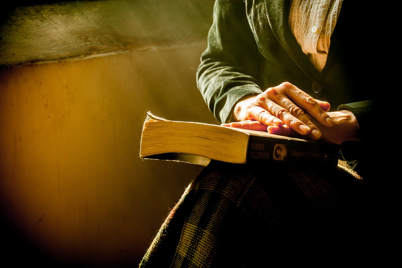 book hands reflecting free photo