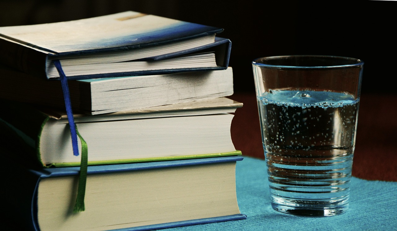 books book stack water glass free photo