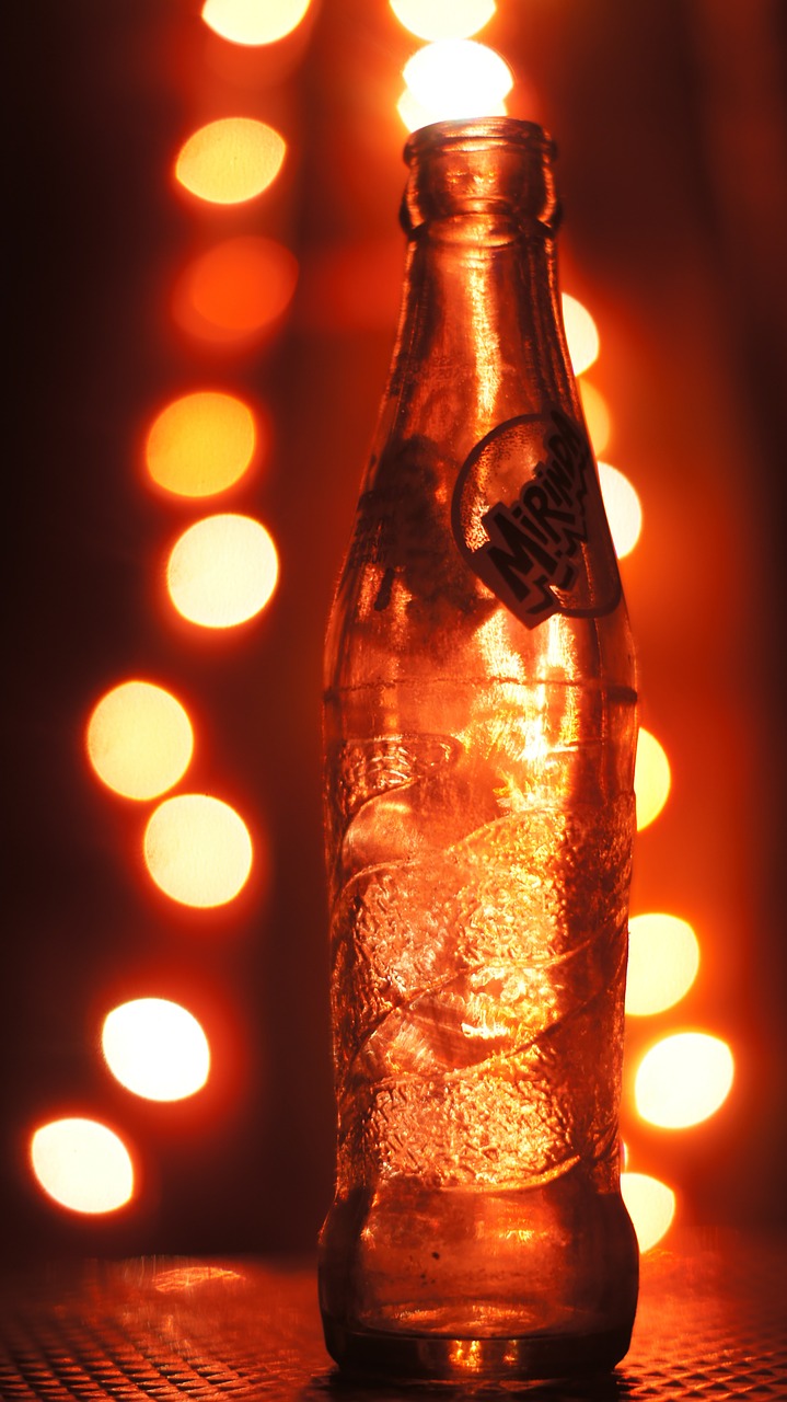 bottle light bokeh free photo