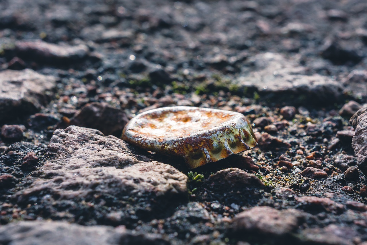 bottle caps  ground  old free photo