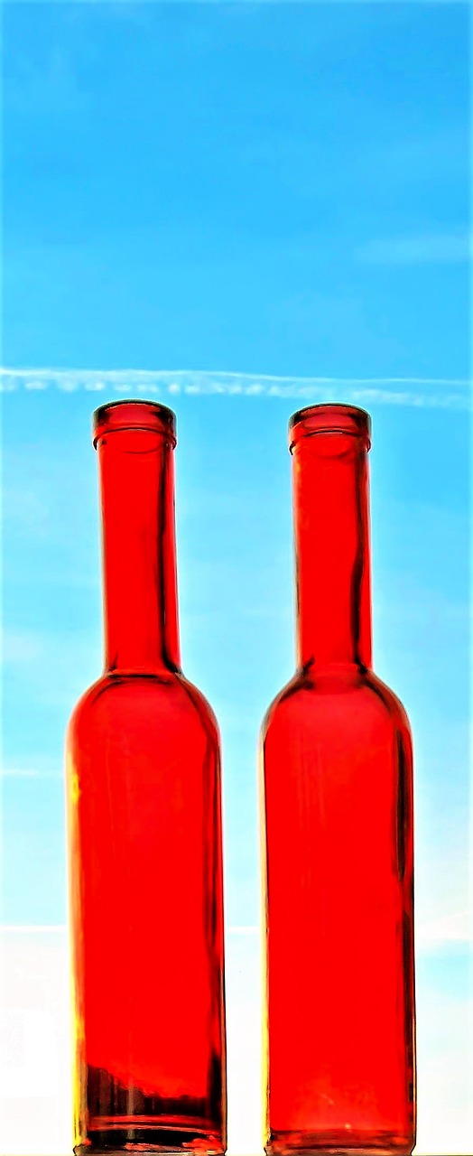 bottles red glass bottles blue sky free photo
