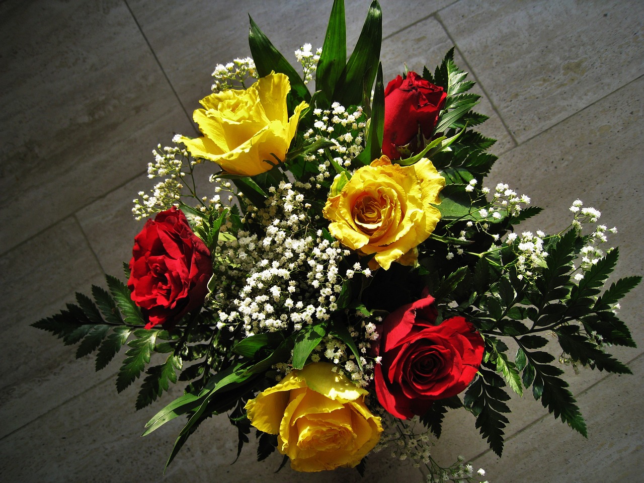 bouquet of roses red and yellow roses he loved flowers free photo