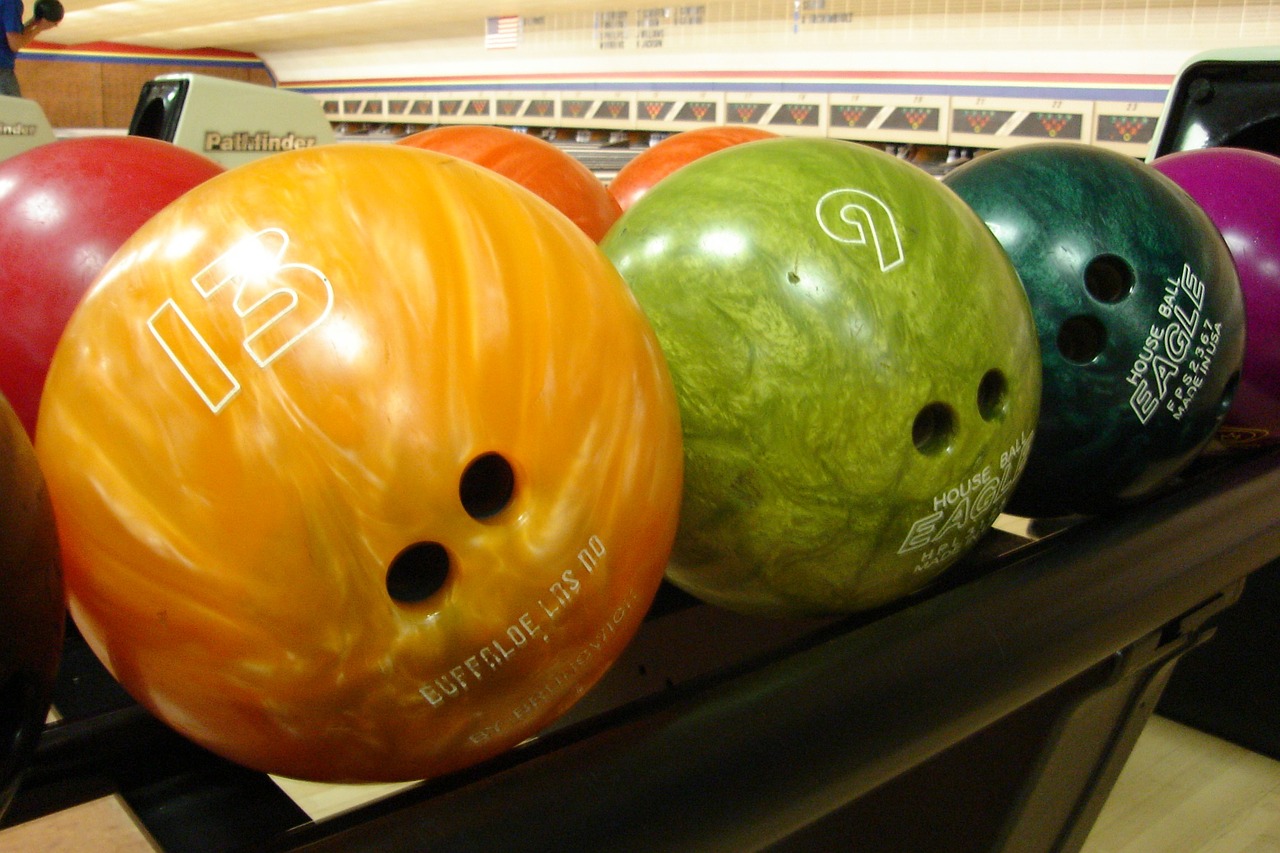 bowling balls rack colors free photo