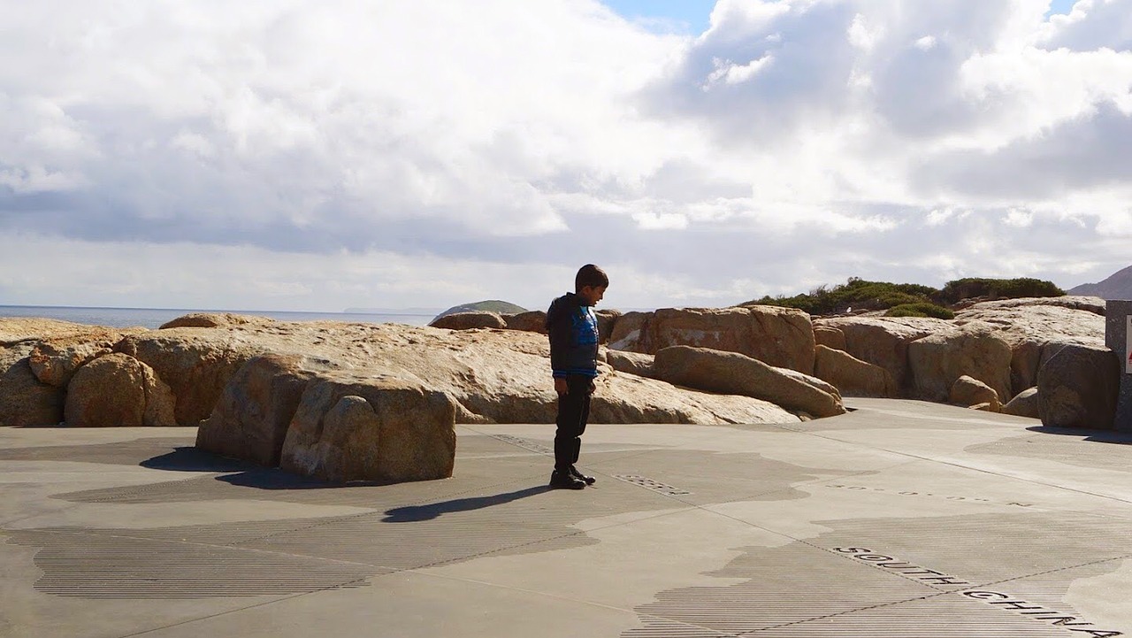 boy rocks sky free photo