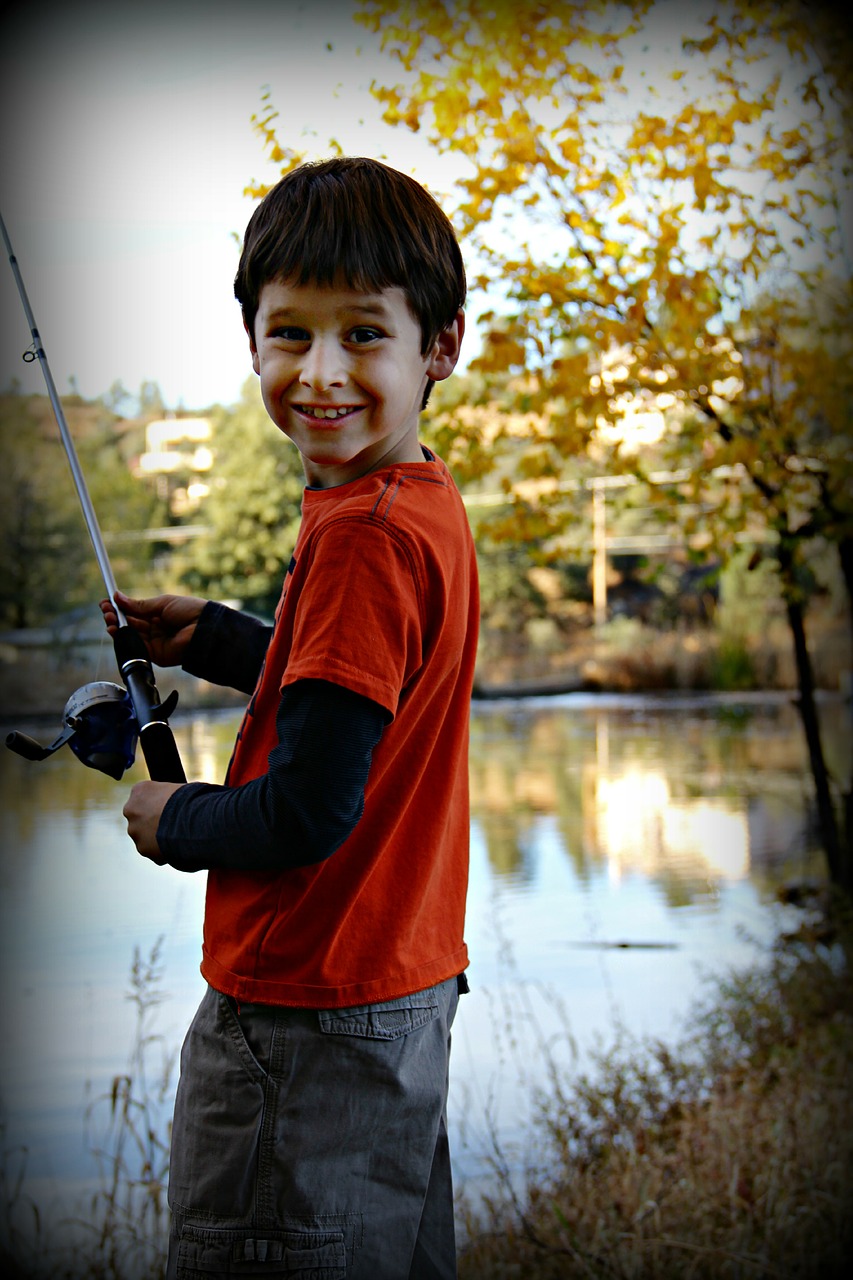 boy fishing happy free photo