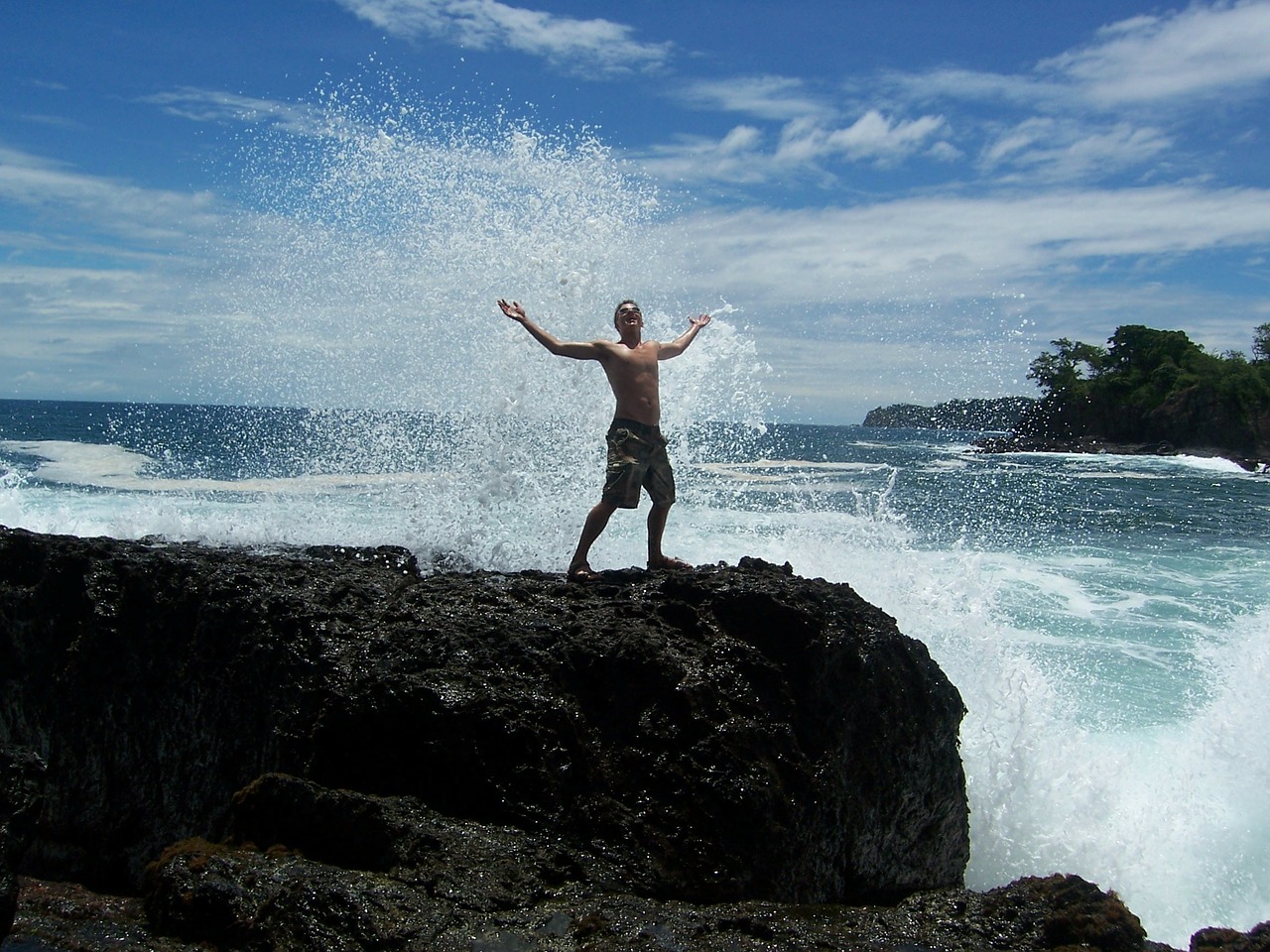 boy in waves people beach free photo