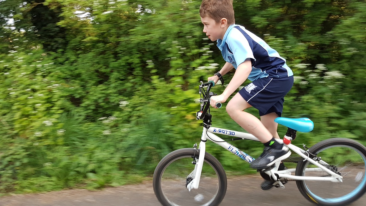 boy outdoors boy on bike bike ride free photo