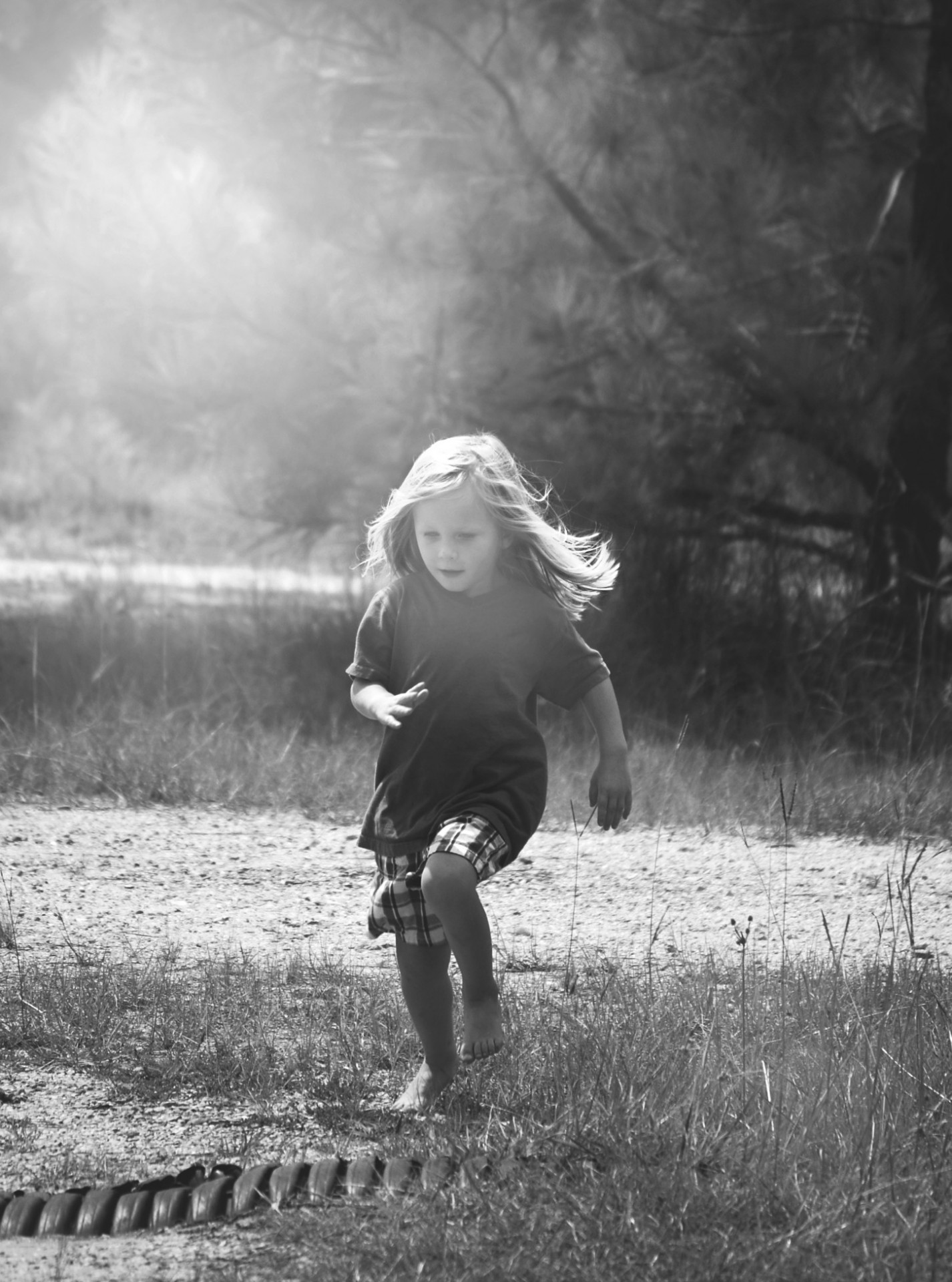 boy running outdoors free photo