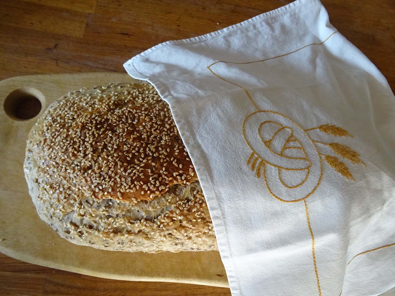 bread covered with a cloth mat free photo