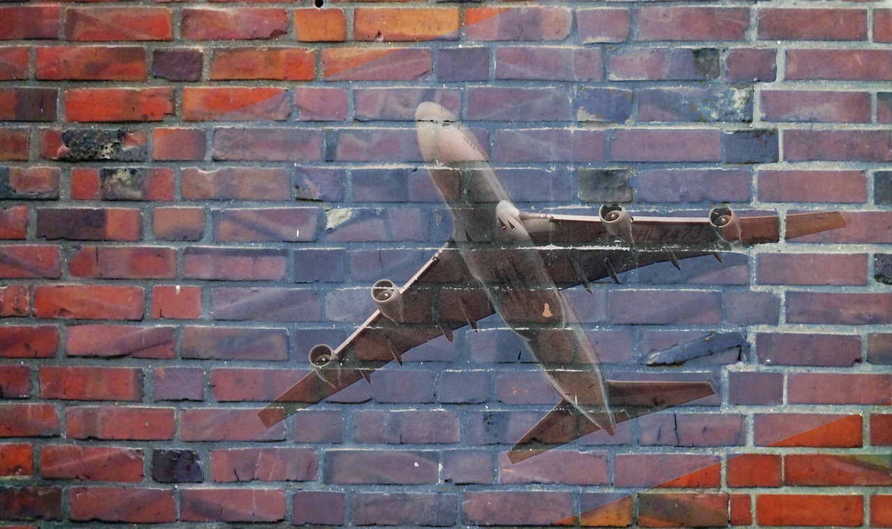 brick  aircraft noise  wall free photo