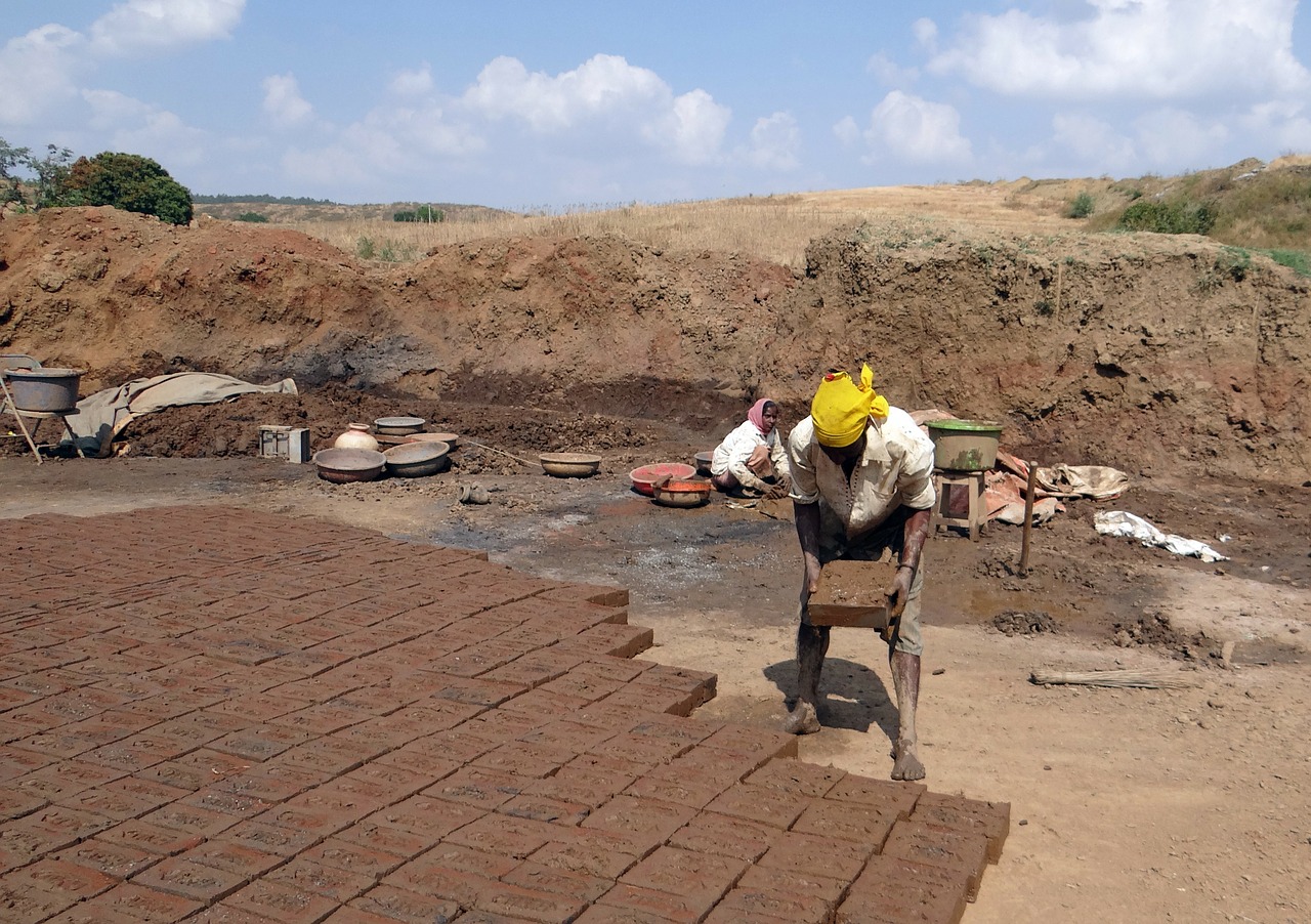 brick-laying brick-making worker free photo