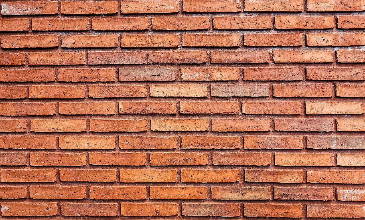 brick wall orange brick wall brick free photo