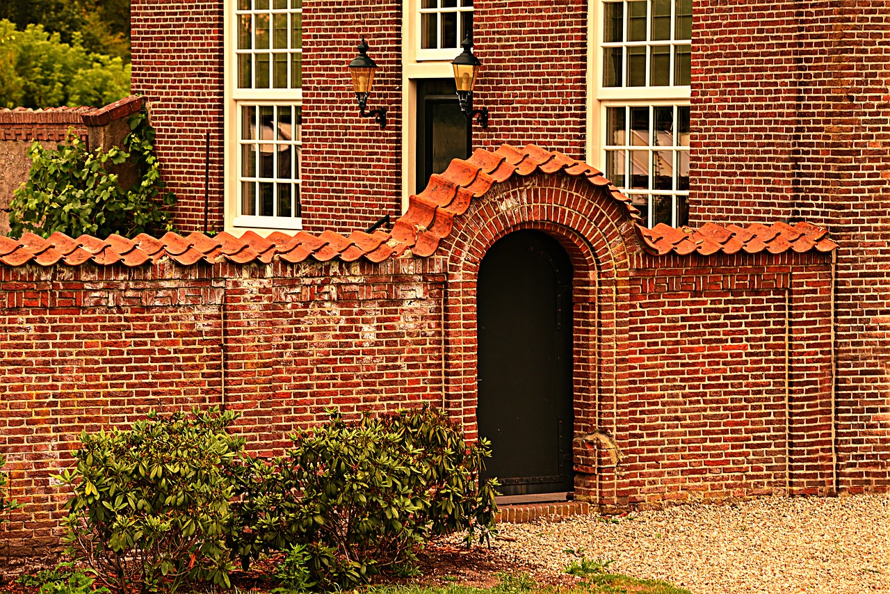 brick wall  door  house free photo