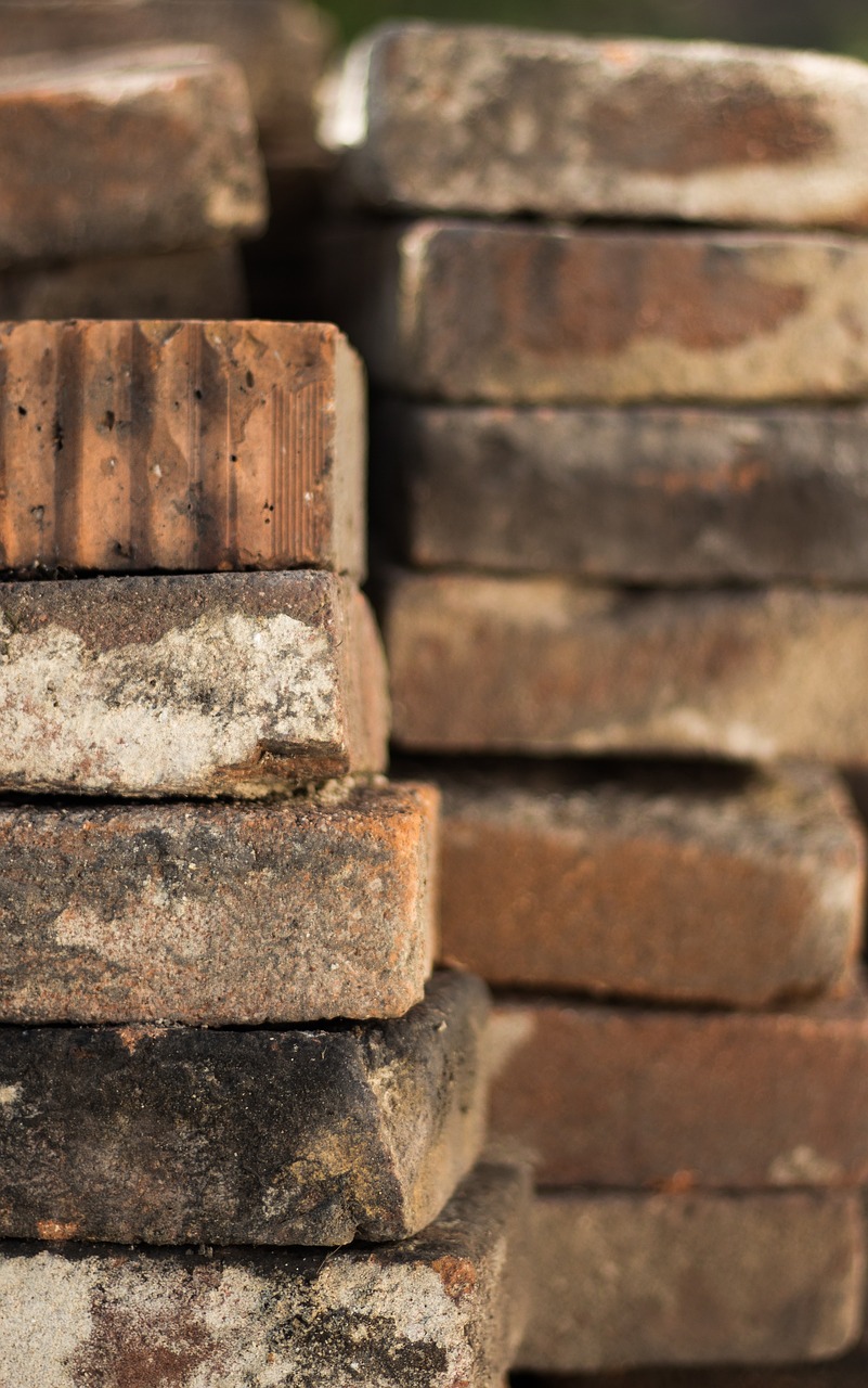 bricks construction site pile free photo