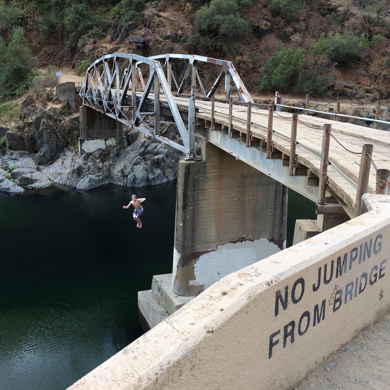 bridge jumping rule breaking free photo