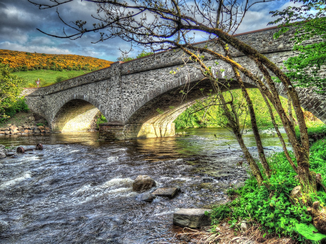 bridge river fast flowing water free photo