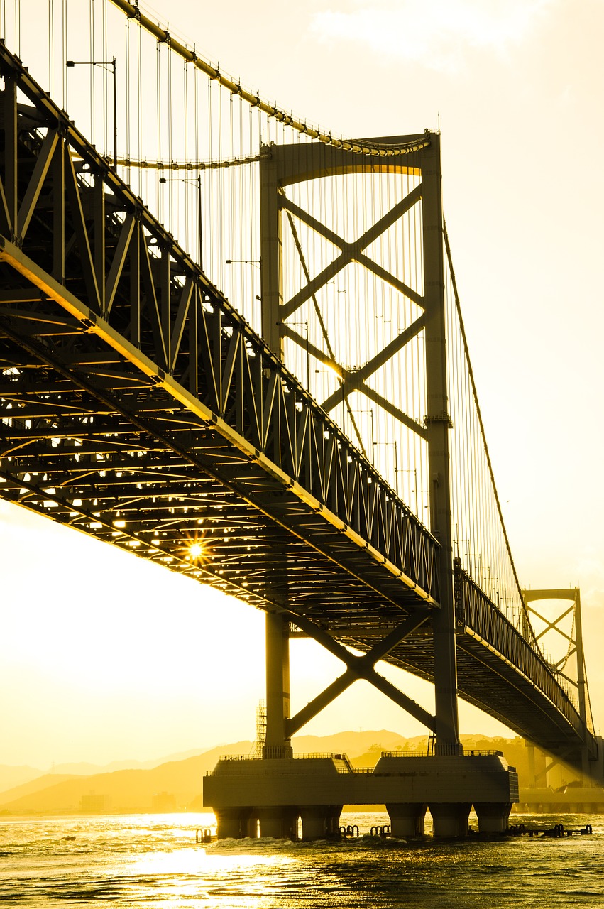 bridge sunset sea free photo