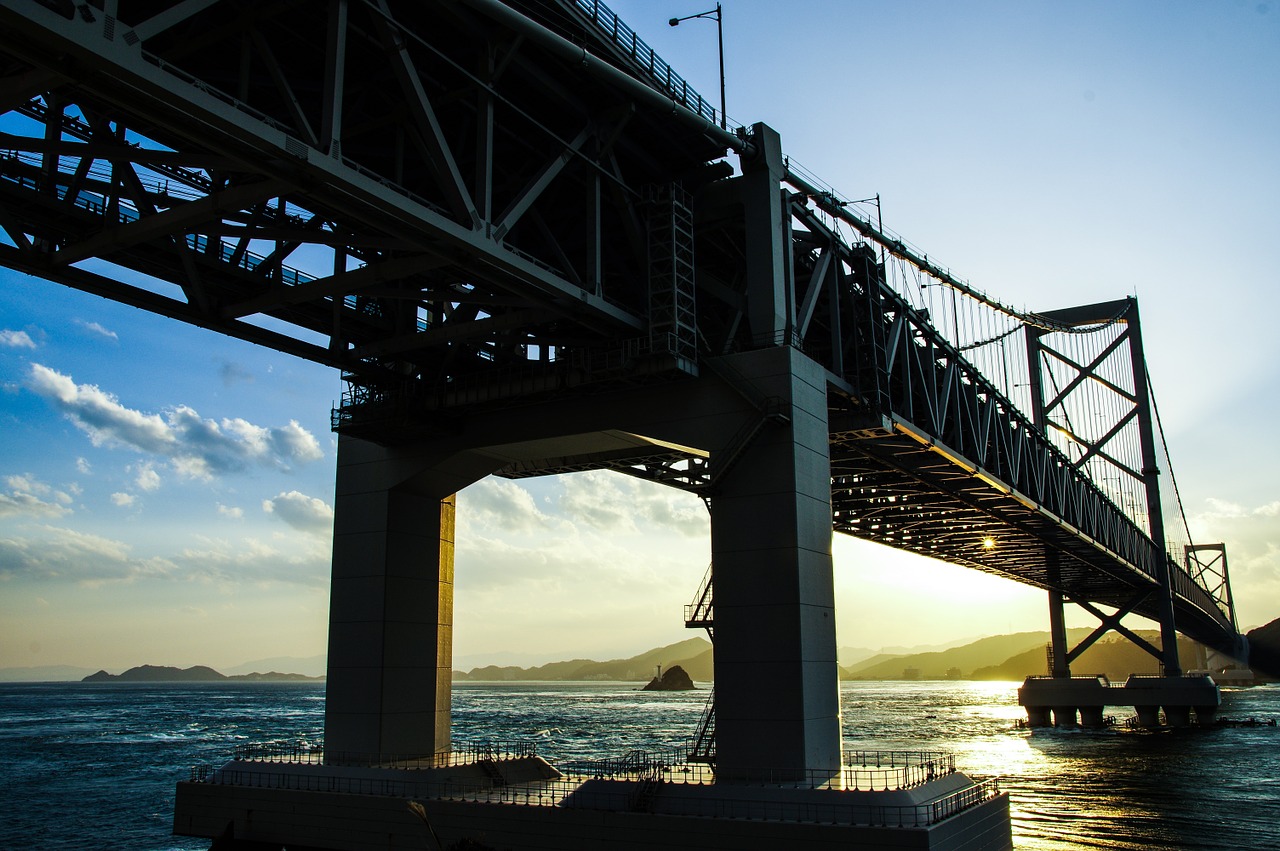 bridge sunset sea free photo