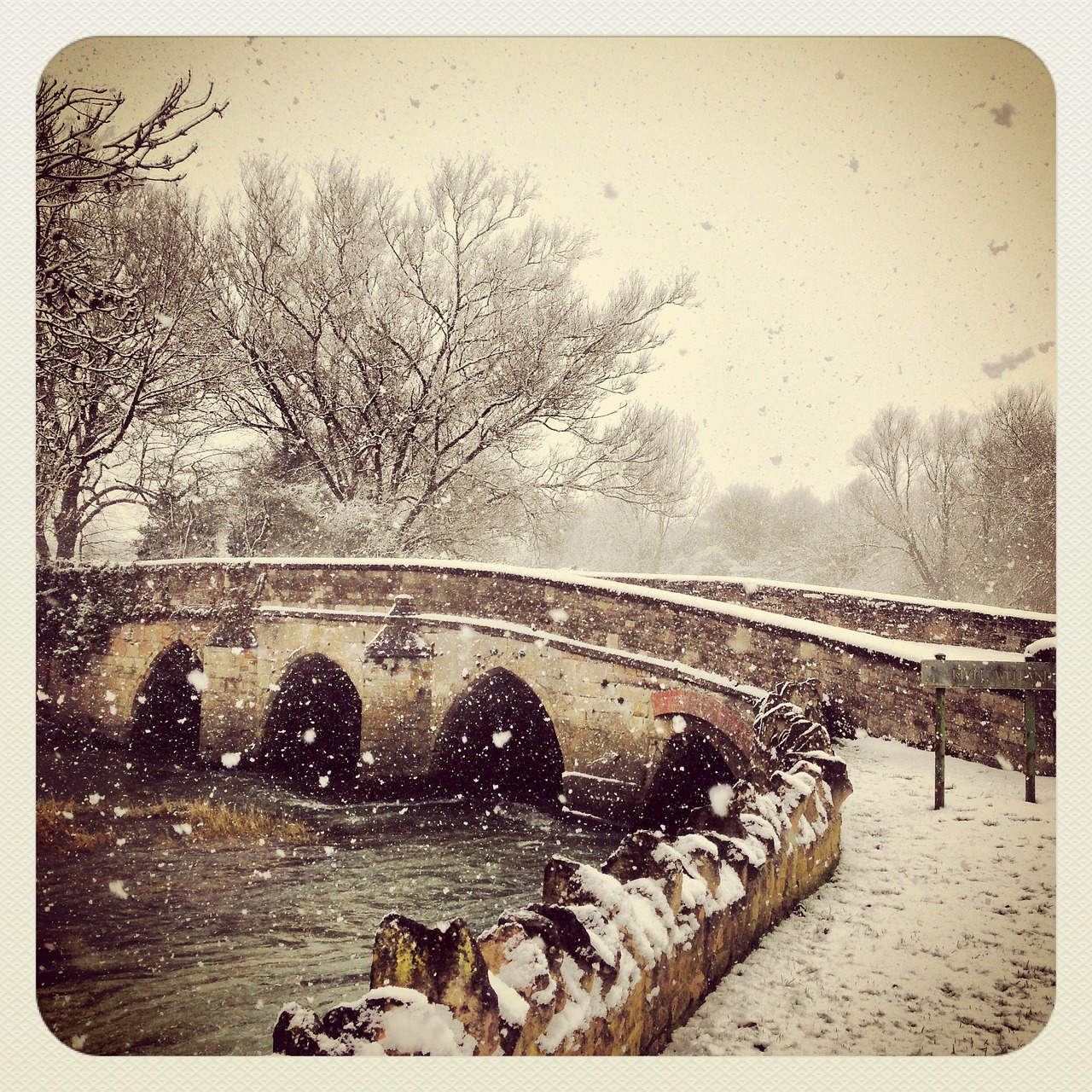 bridge water snow free photo