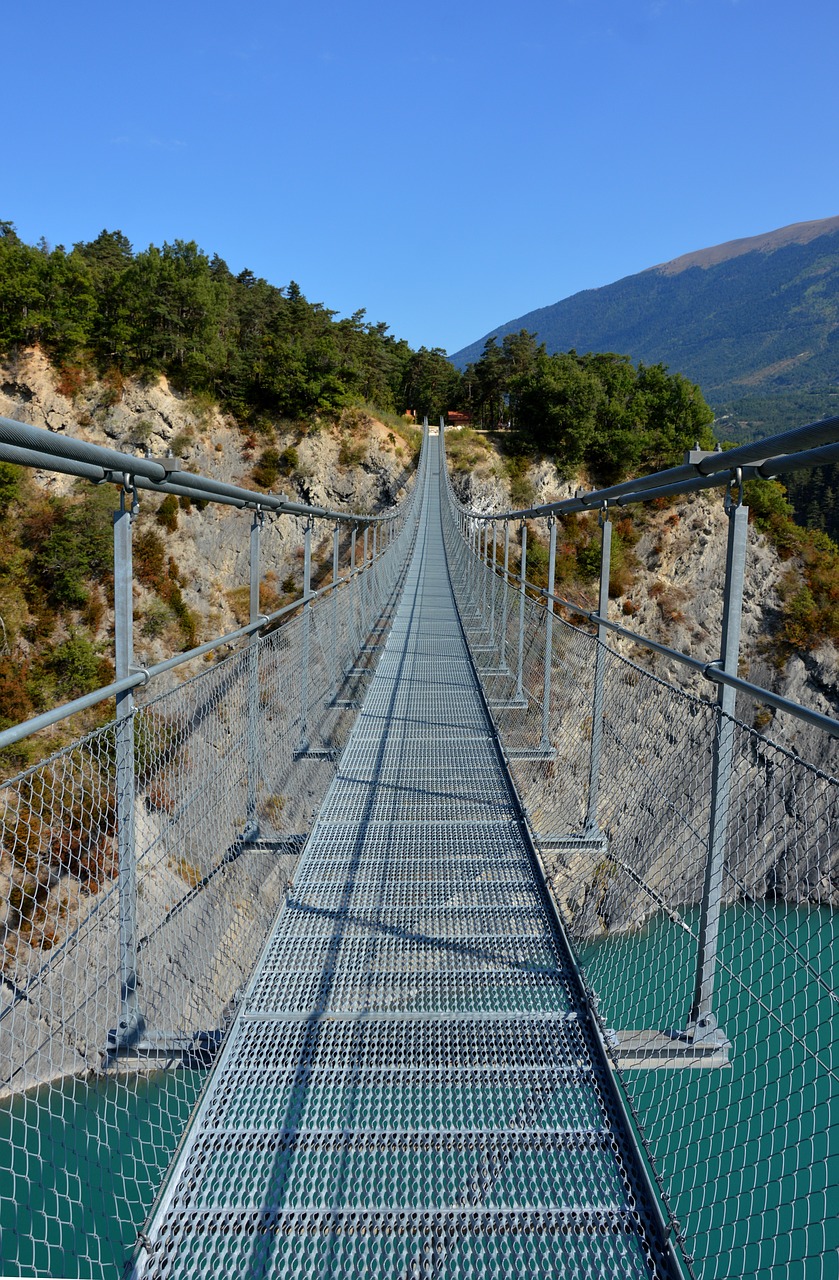 bridge suspension bridge lake free photo