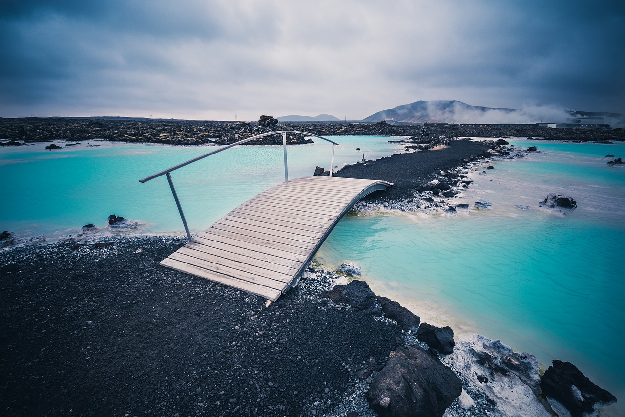 bridge clouds land formation free photo