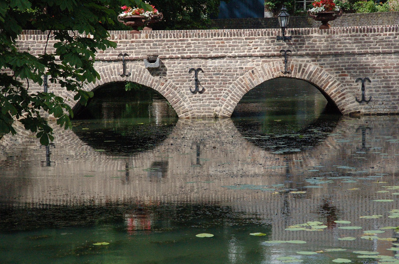 bridge mirroring reflections free photo