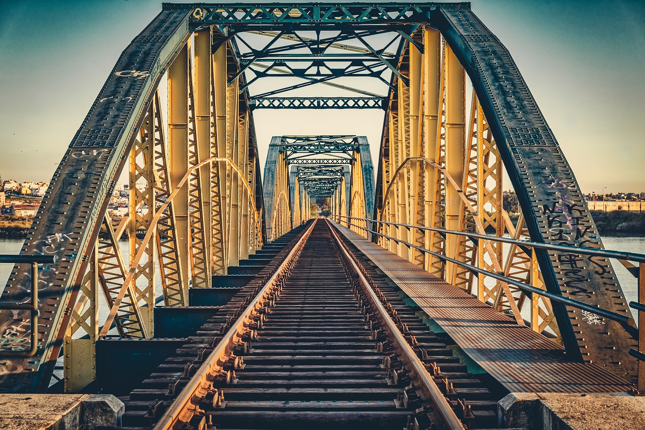 bridge  railroad  sunset free photo