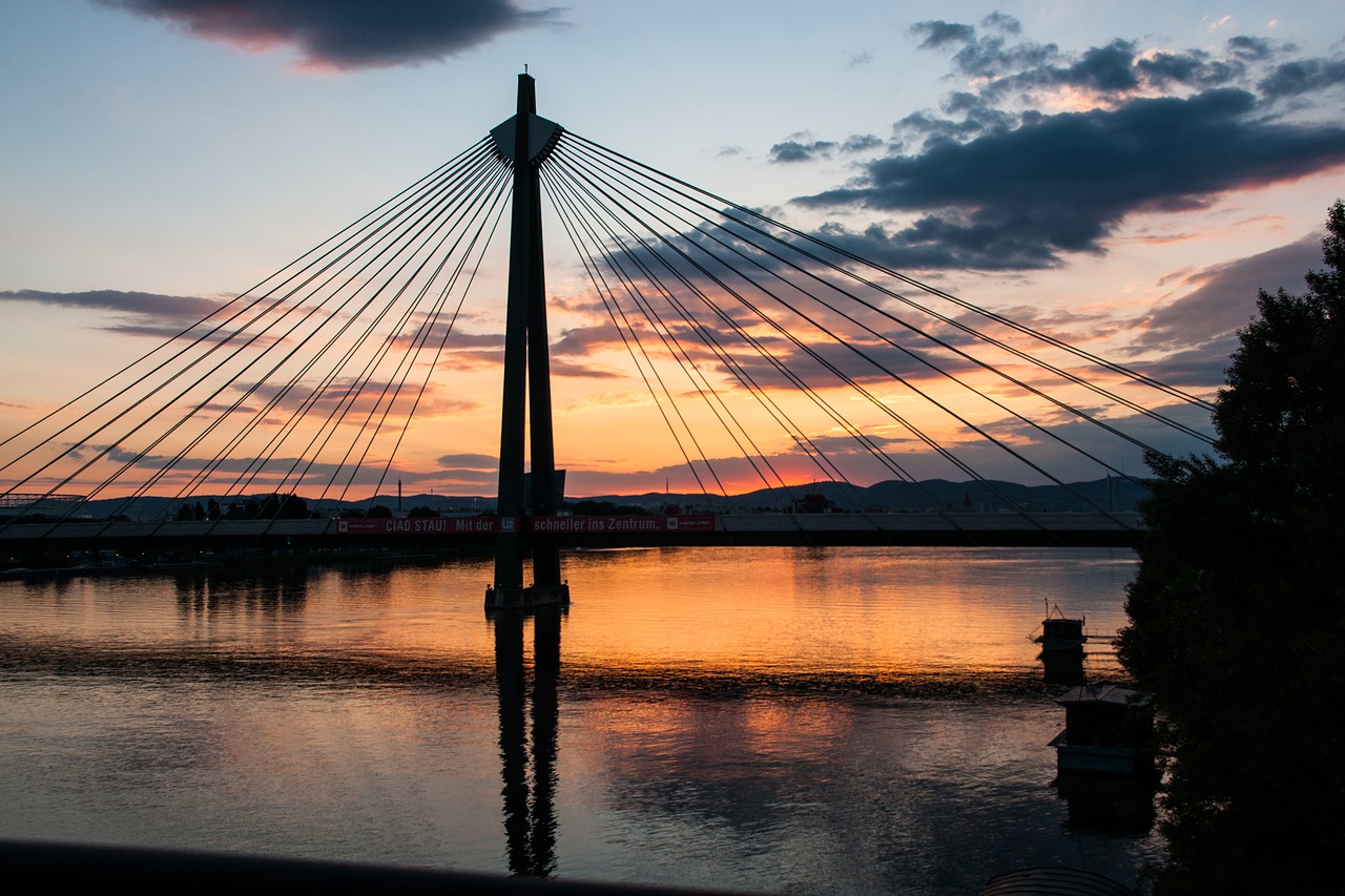 bridge  sunset  river free photo