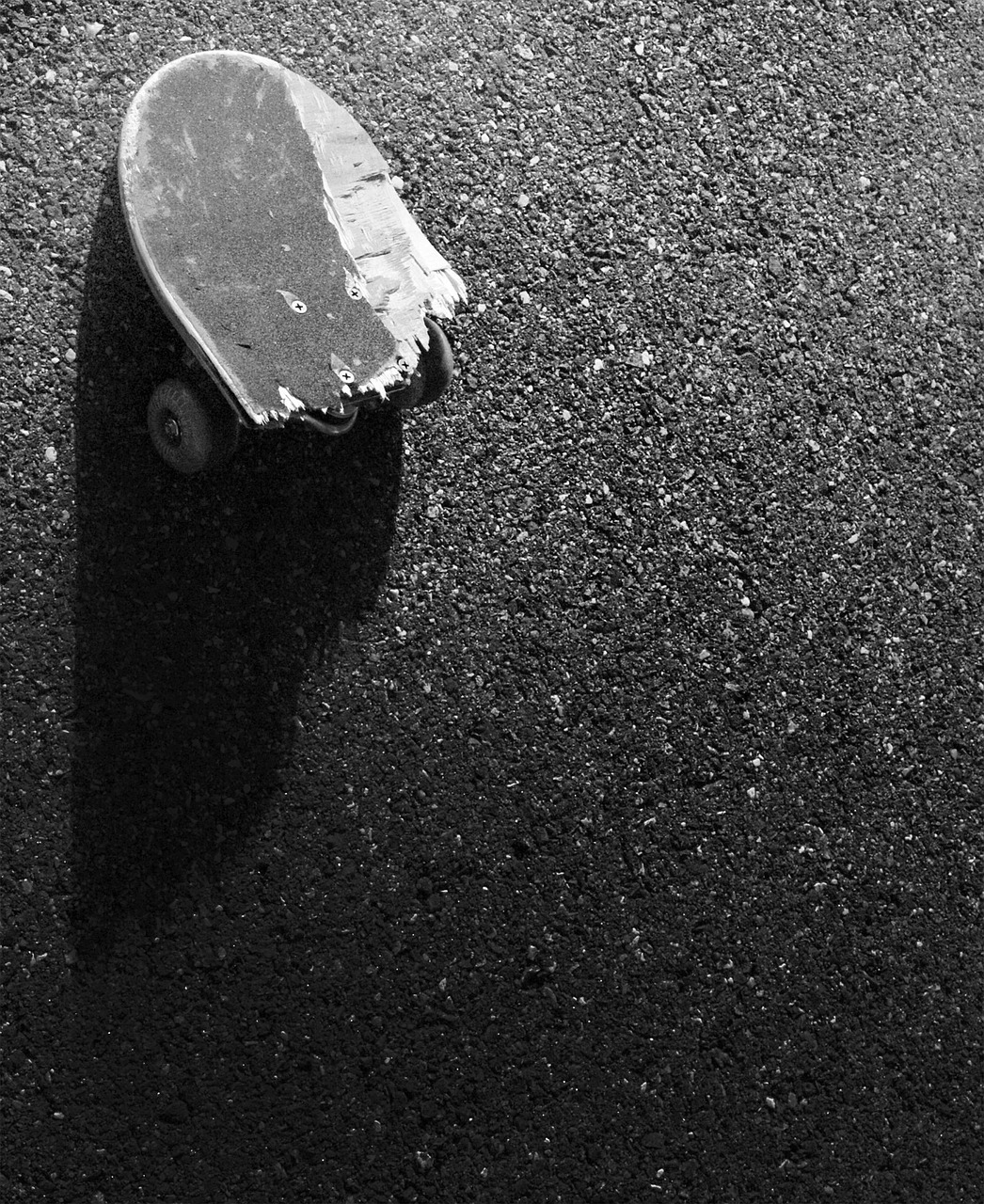broken skateboard pavement free photo