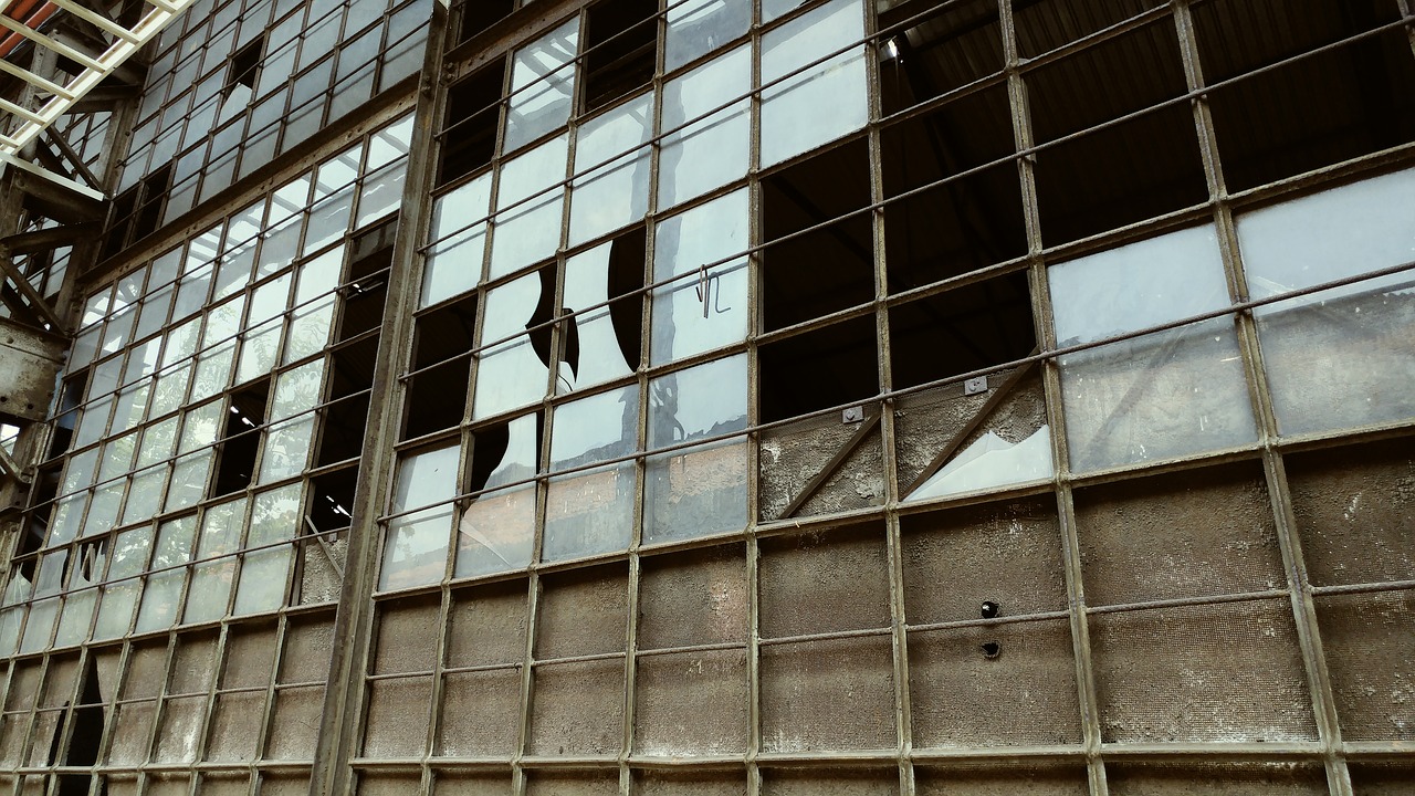 broken windows abandoned old building free photo