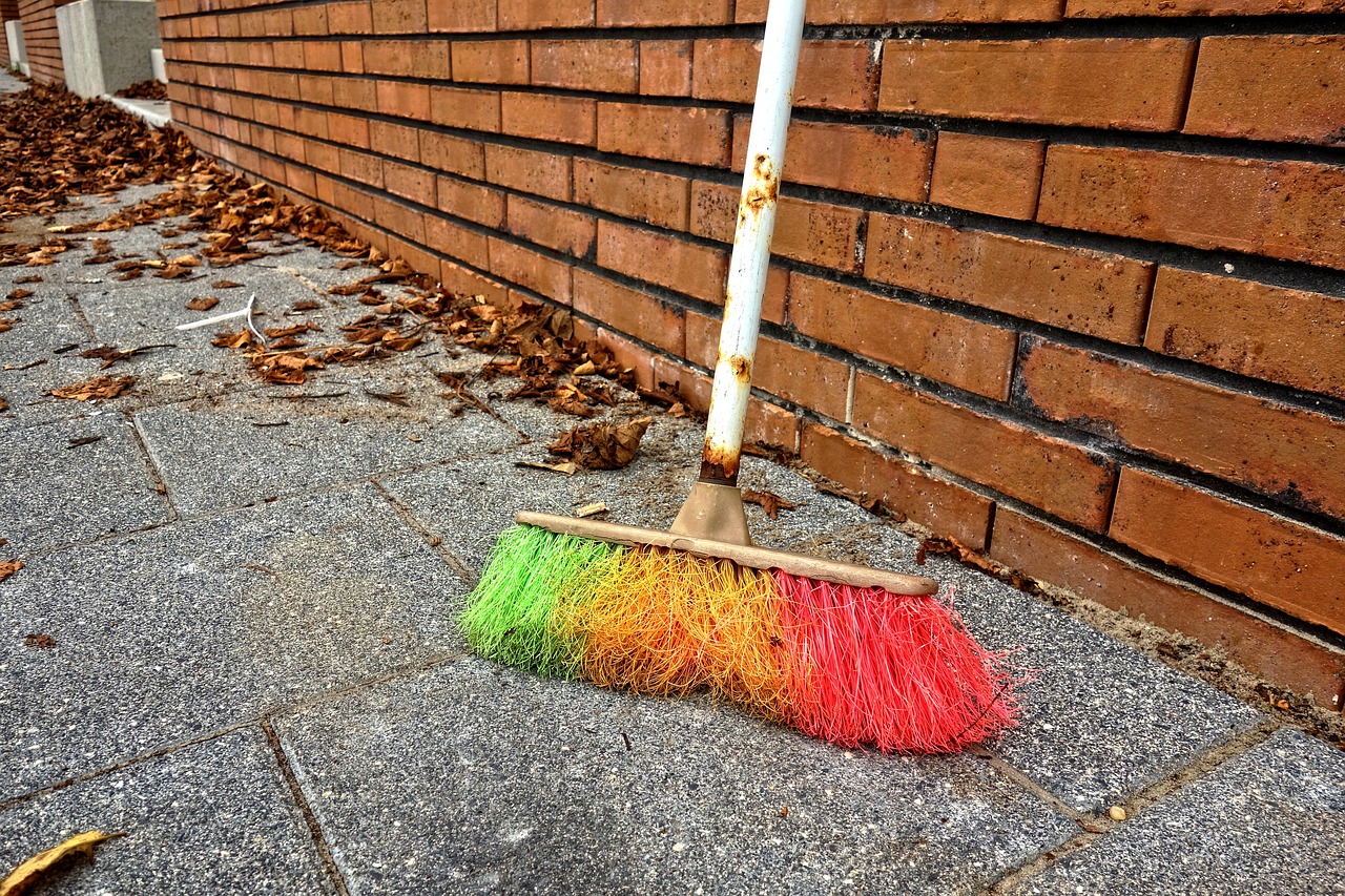 broom sweeping dust free photo