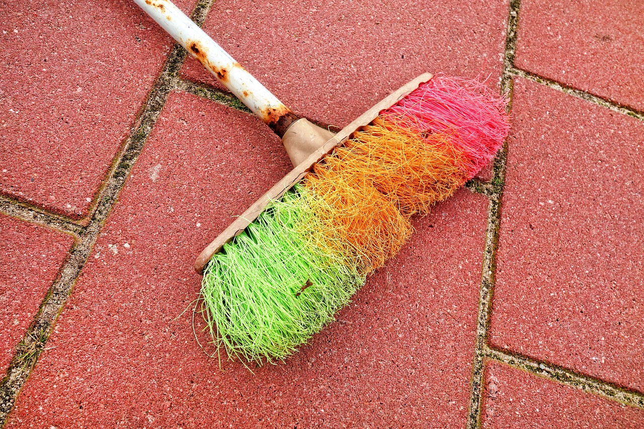 broom sweeping dust free photo
