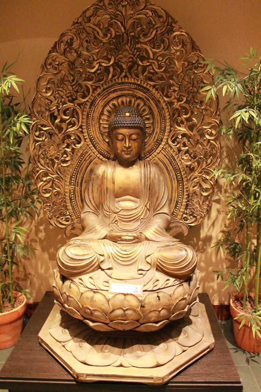 a green glass buddha singapore free photo