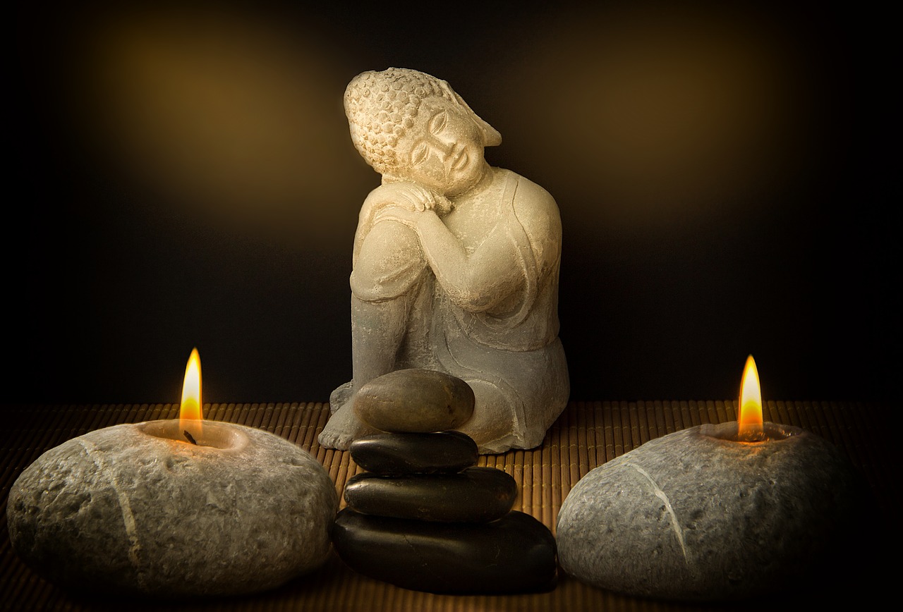 buddha  candles  stones free photo