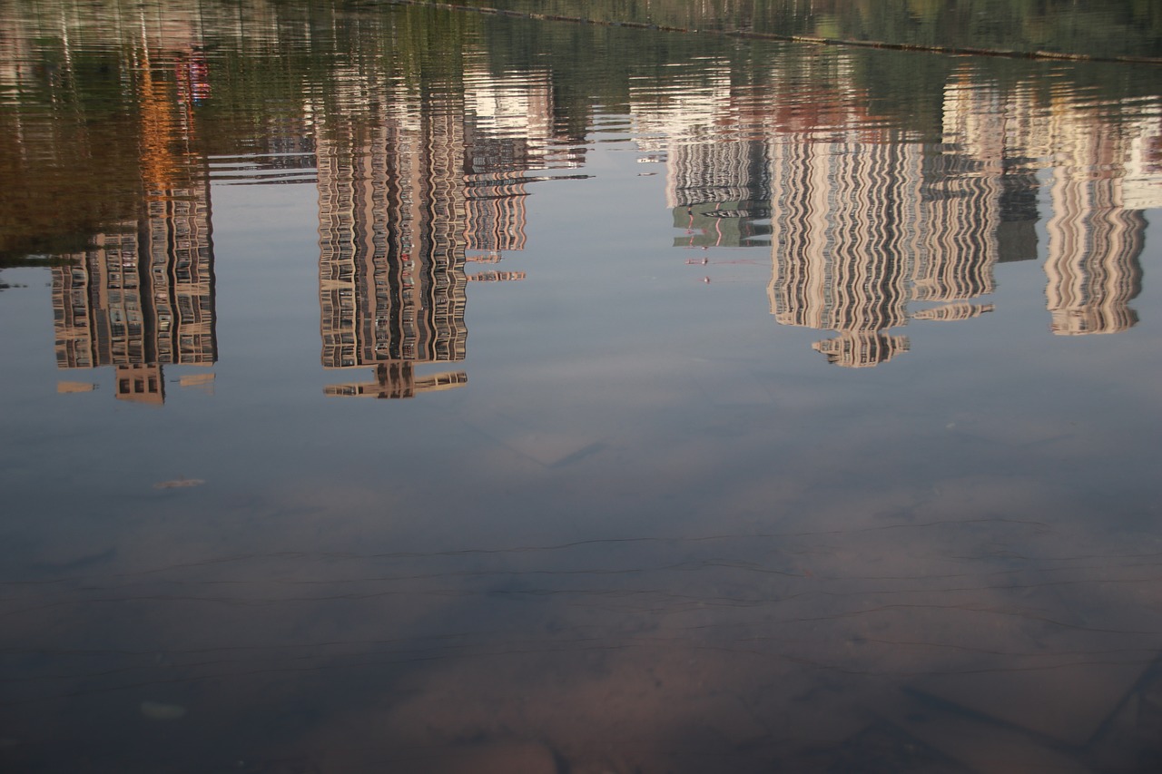 building  reflection  the water free photo