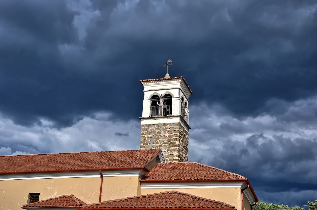 building  tower  clouds free photo