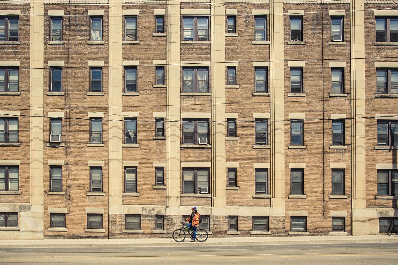 building cyclist bicycle free photo