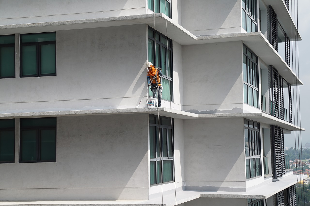 building maintenance  job in the air  safety first free photo