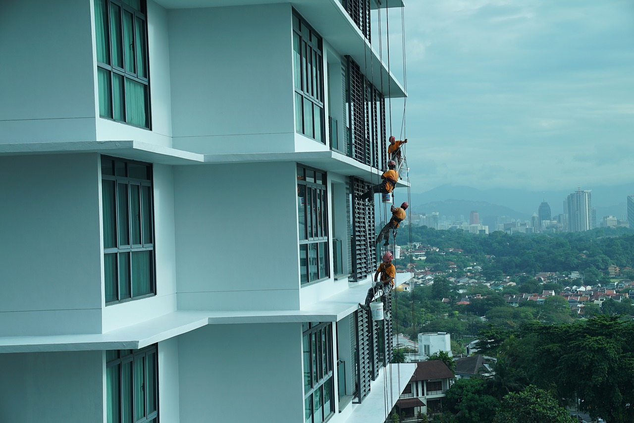 building maintenance  job in the air  safety first free photo