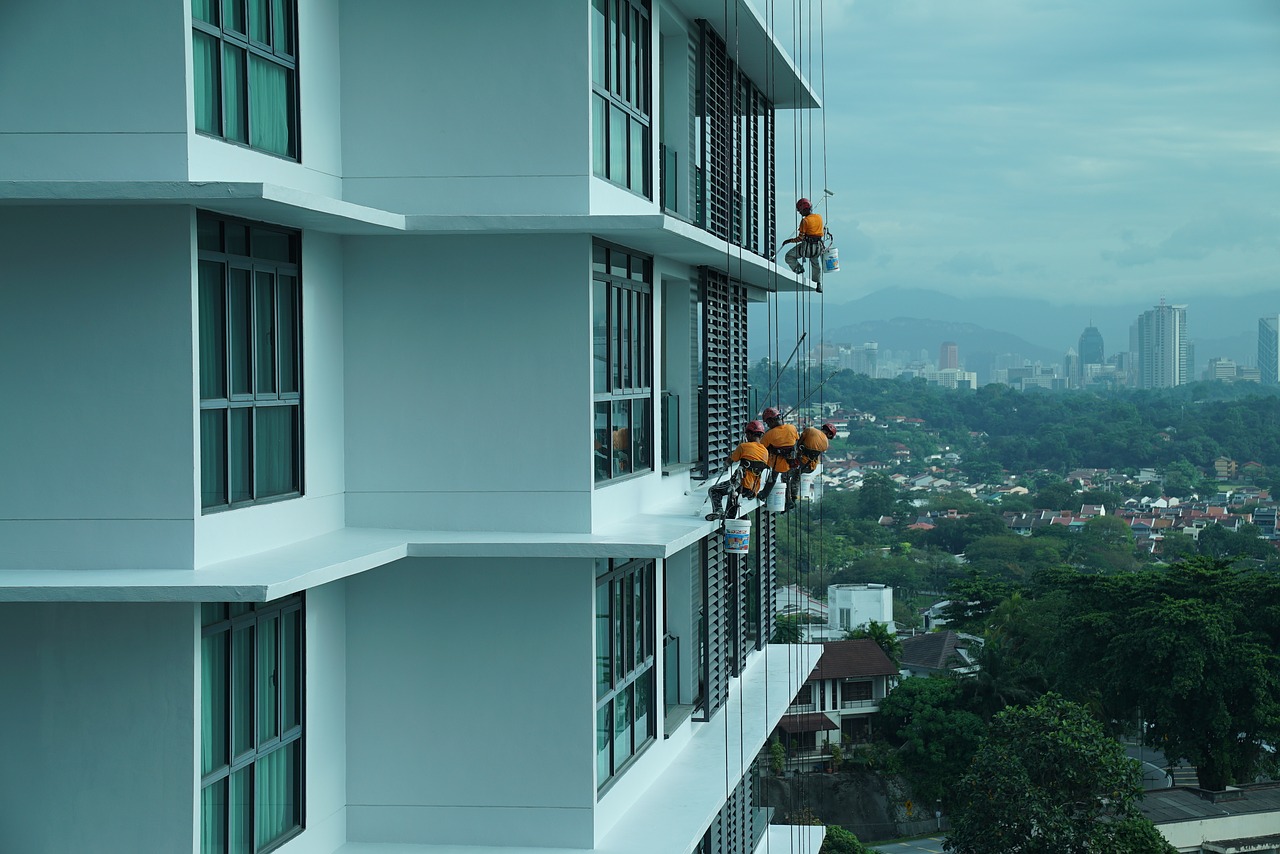 building maintenance  job in the air  safety first free photo