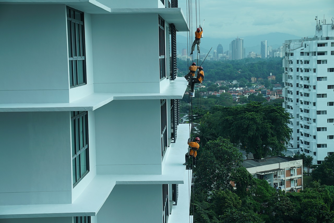 building maintenance  job in the air  safety first free photo