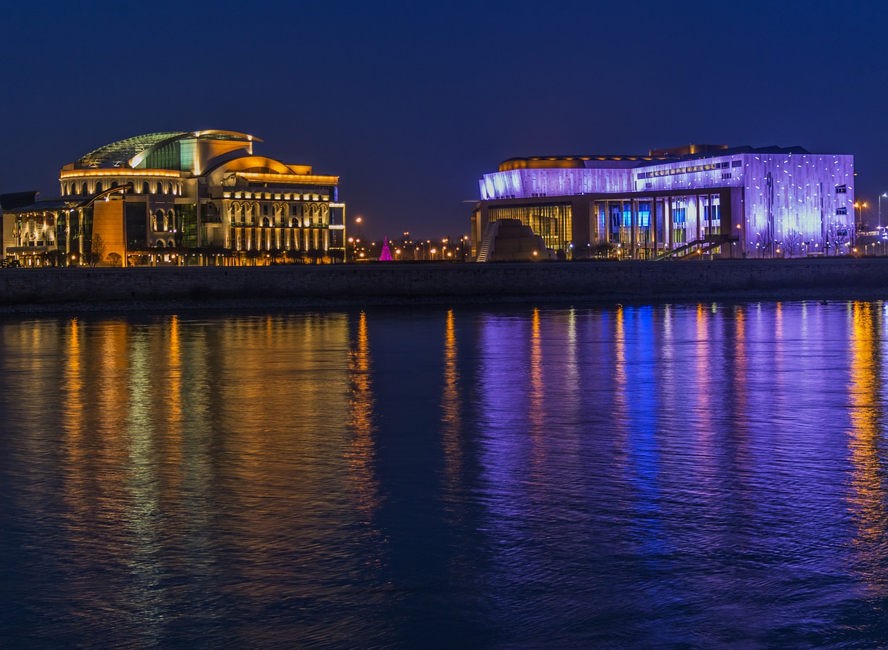 buildings at night lights free photo