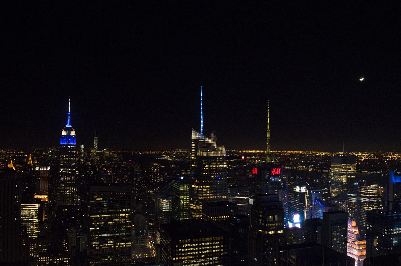 buildings night new york city free photo