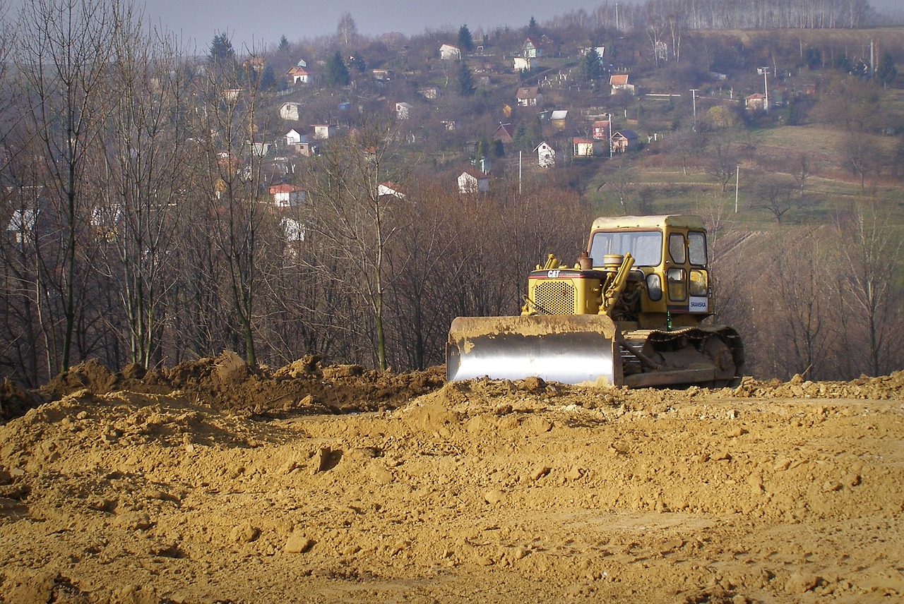 bulldozer excavator construction machine free photo