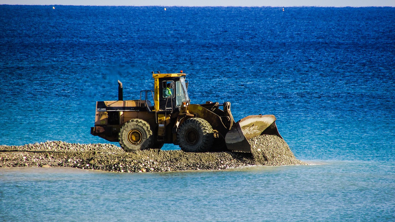 bulldozer unload gravel free photo