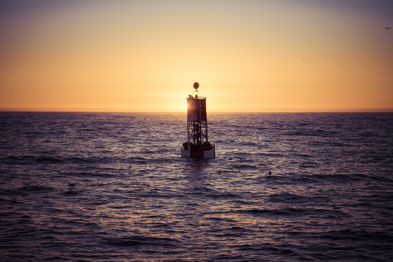 buoy sunset ocean free photo