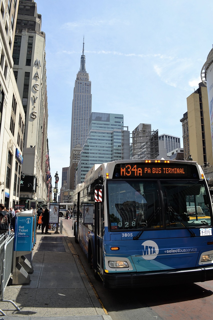 bus empire state building new york city free photo