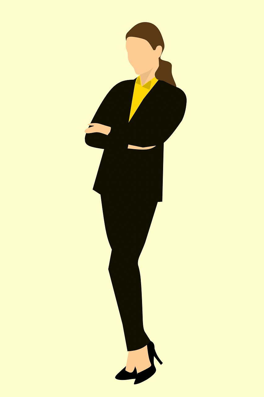 business woman standing arms crossed free photo