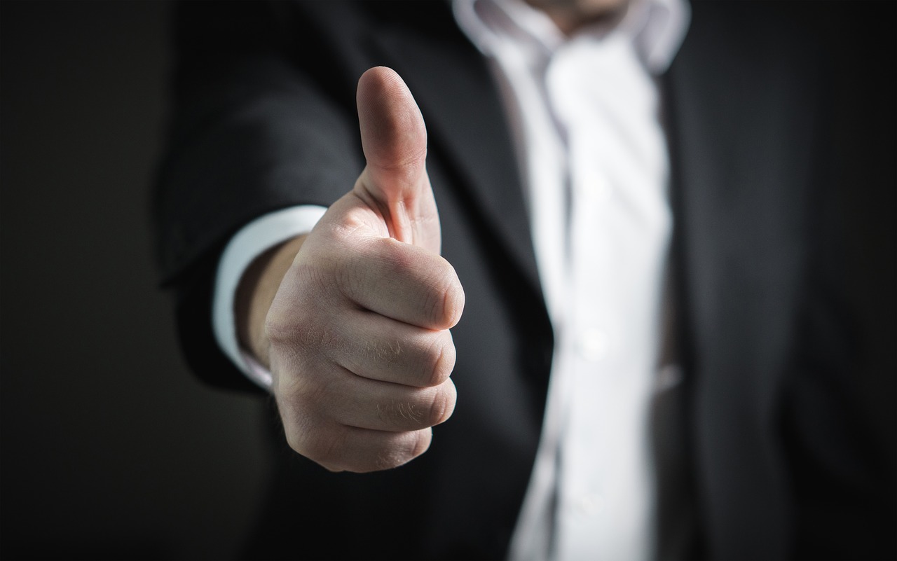 businessman thumbs up success free photo