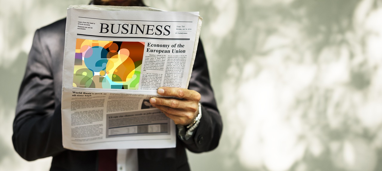 businessman  newspaper  read free photo